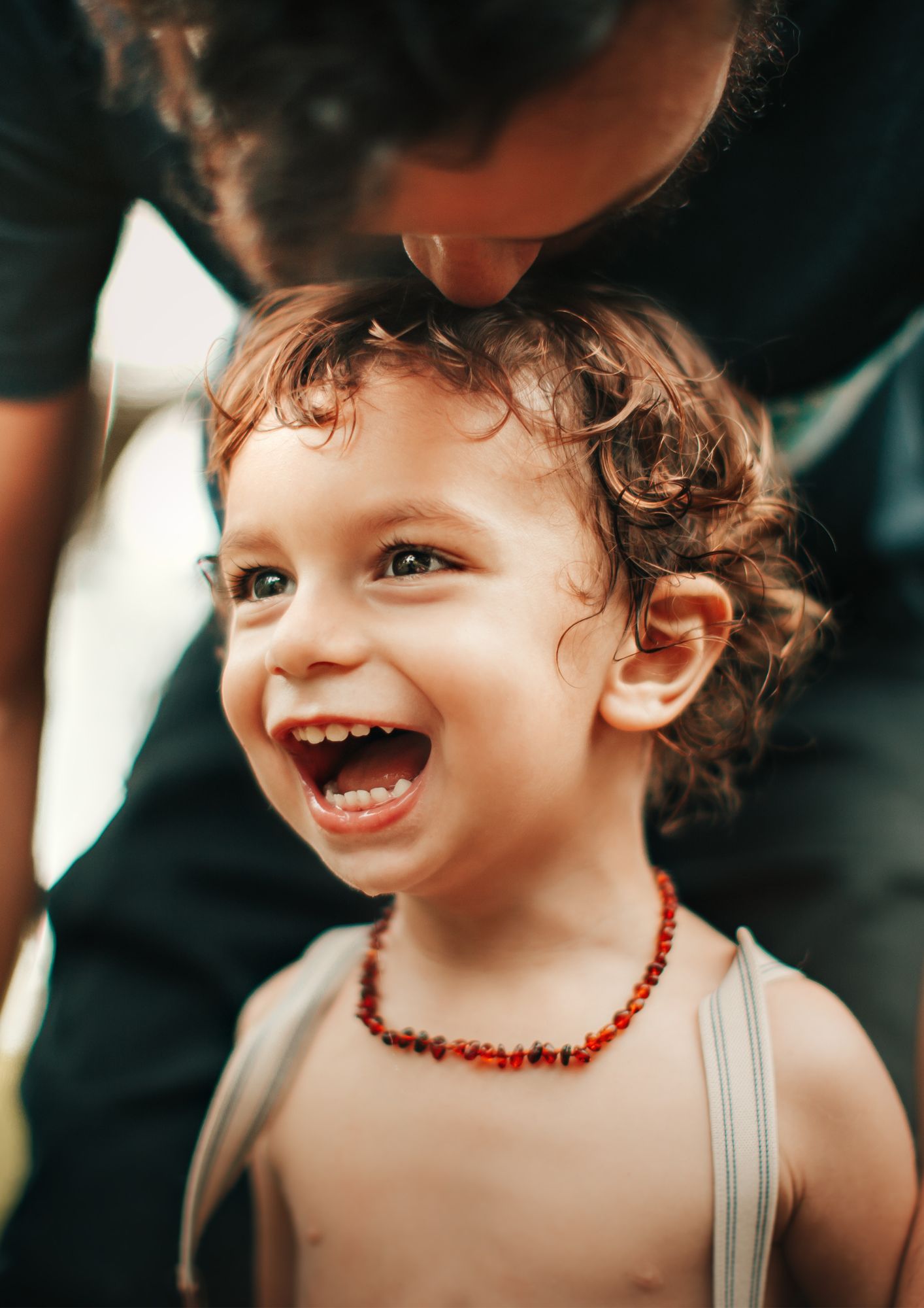 Happy child with a joyful smile, symbolizing a positive child custody outcome and parental care