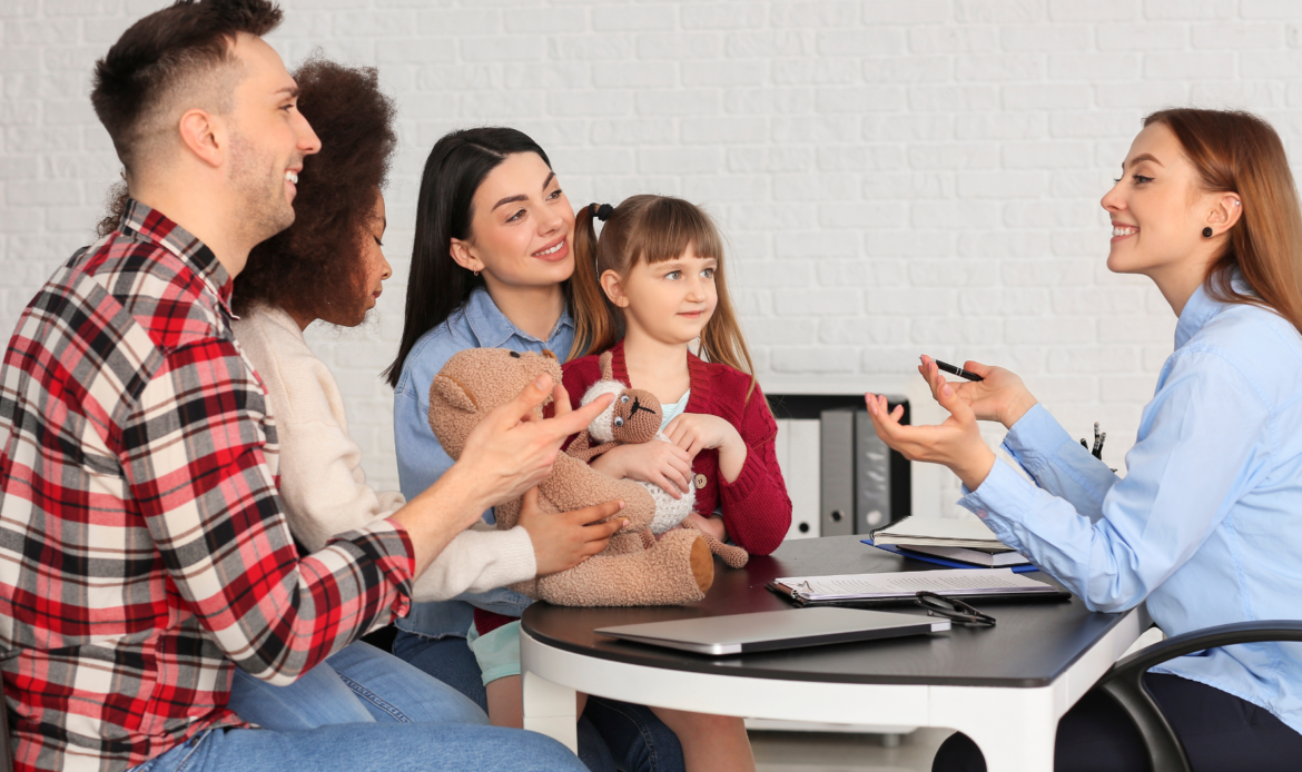 A happy family consulting with a legal professional about child custody, ensuring the best interests of the child in the custody process.